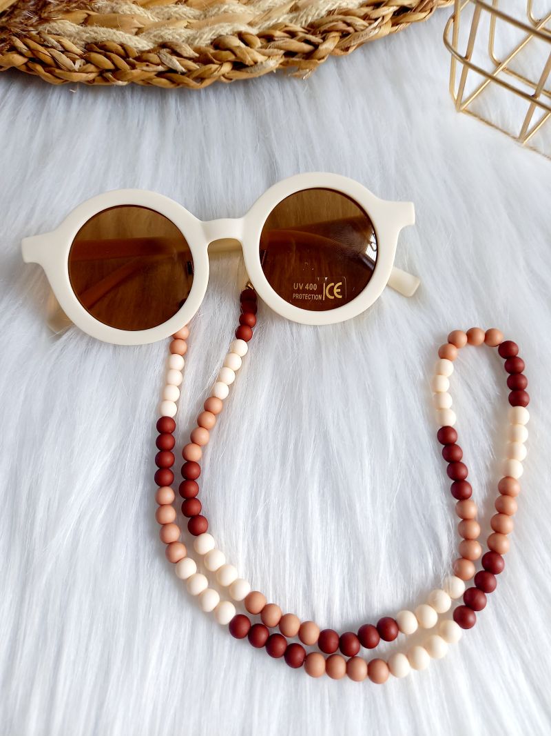 Kinder-Sonnenbrille mit UV400-Schutz und hübscher Perlenkette in Rosa-Violett-Tönen – ideal für den Sommer