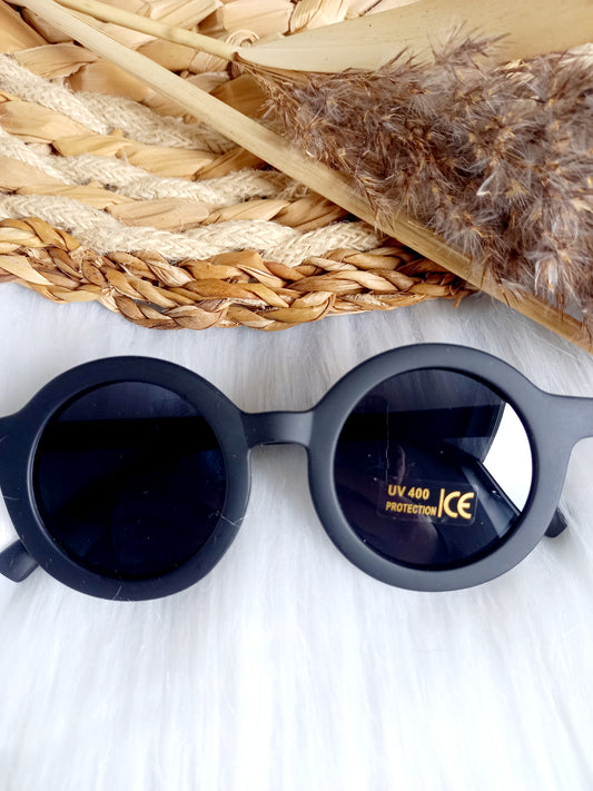 Runde Sonnenbrille für Kinder in Dunkelblau mit UV400-Schutz, modernes Design, ideal für sonnige Tage ab 1 Jahr